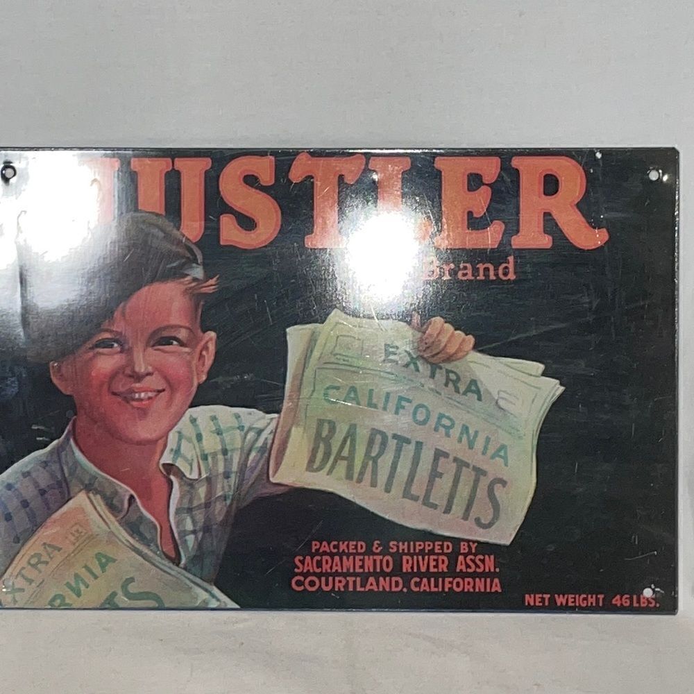 Hustler brand sign  